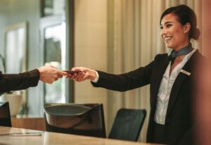 role description for receptionist in hotel in uae