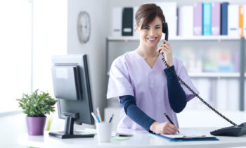 essential qualification for receptionist in hospital